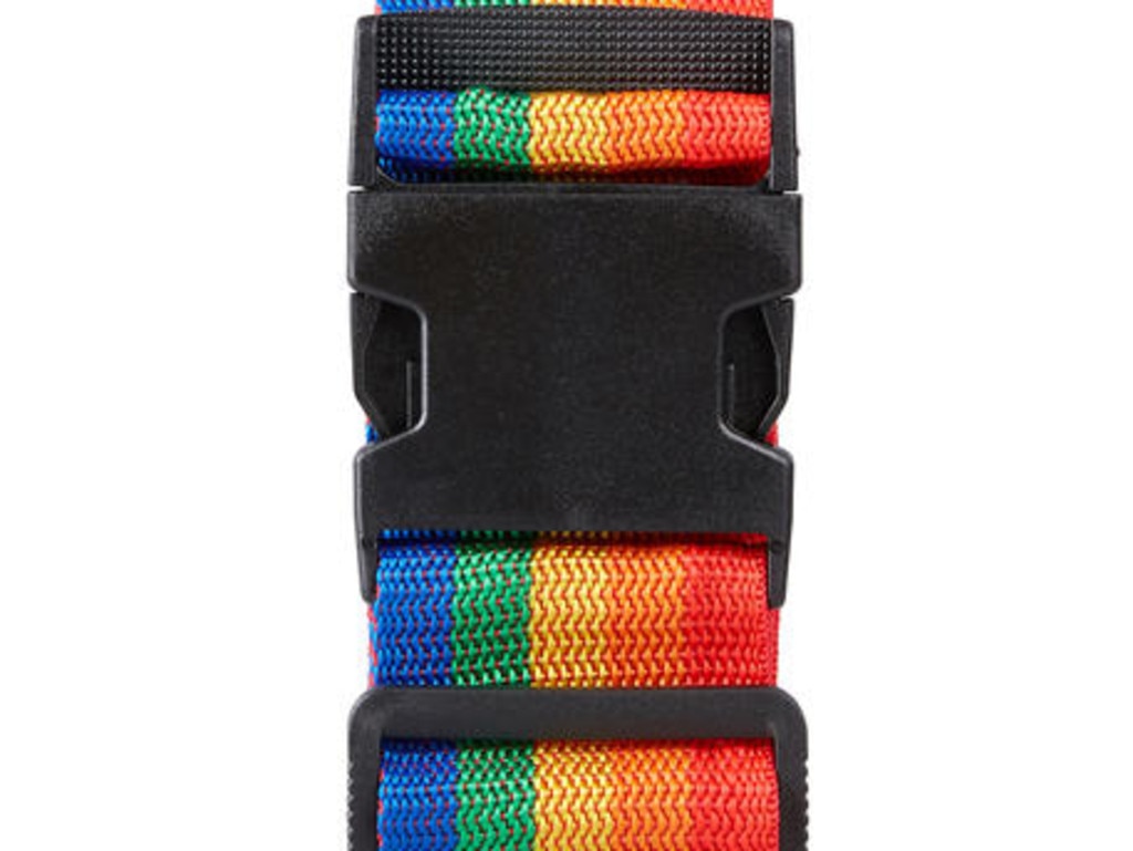 Never lose your bag again with this bright <a href="https://www.kmart.com.au/product/luggage-strap---stripe/1084319" rel="nofollow" target="_blank">$5 luggage strap</a>. It’s fully adjustable and the colourful stripes will make identifying your luggage on the carousel nice and easy. Picture: Kmart