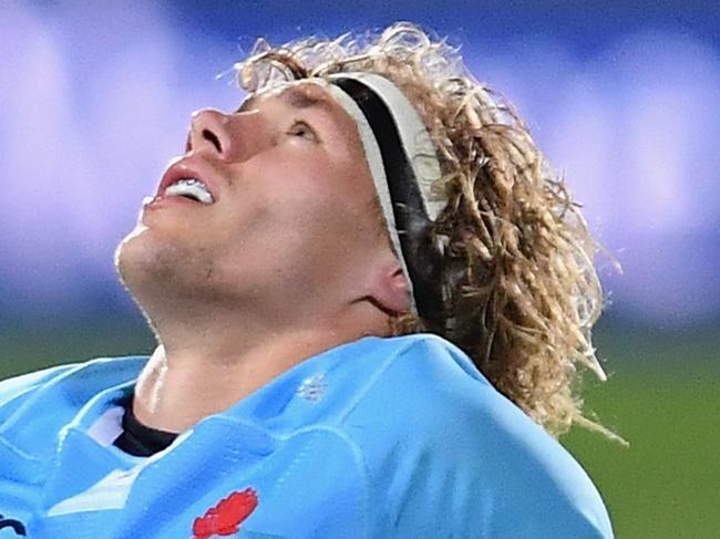 CHRISTCHURCH, NEW ZEALAND - MAY 12:  Ned Hanigan of the Waratahs receives medical help during the round 12 Super Rugby match between the Crusaders and the Waratahs at AMI Stadium on May 12, 2018 in Christchurch, New Zealand.  (Photo by Kai Schwoerer/Getty Images)