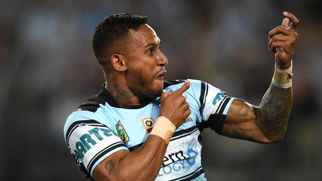 Ben Barba of the Sharks celebrates scoring a try.