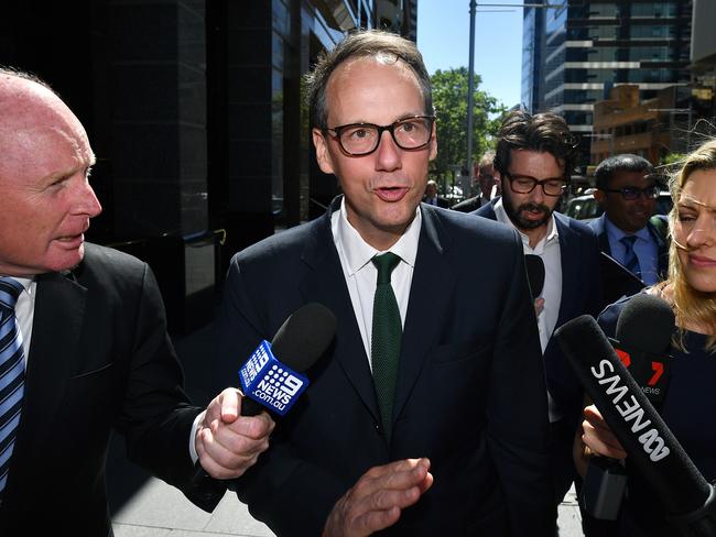 Australian Securities & Investments Commission (ASIC) chairman James Shipton (left) leaves the Royal Commission into Misconduct in the Banking, Superannuation and Financial Services Industry in Sydney, Friday, November 23, 2018. (AAP Image/Joel Carrett) NO ARCHIVING