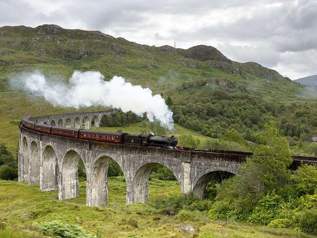 The Jacobite stream train on the real-life Glenfinnan Viaduct.
