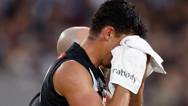 Scott Pendlebury came off the ground with blood coming from his face. Picture: Michael Willson/AFL Photos via Getty Images