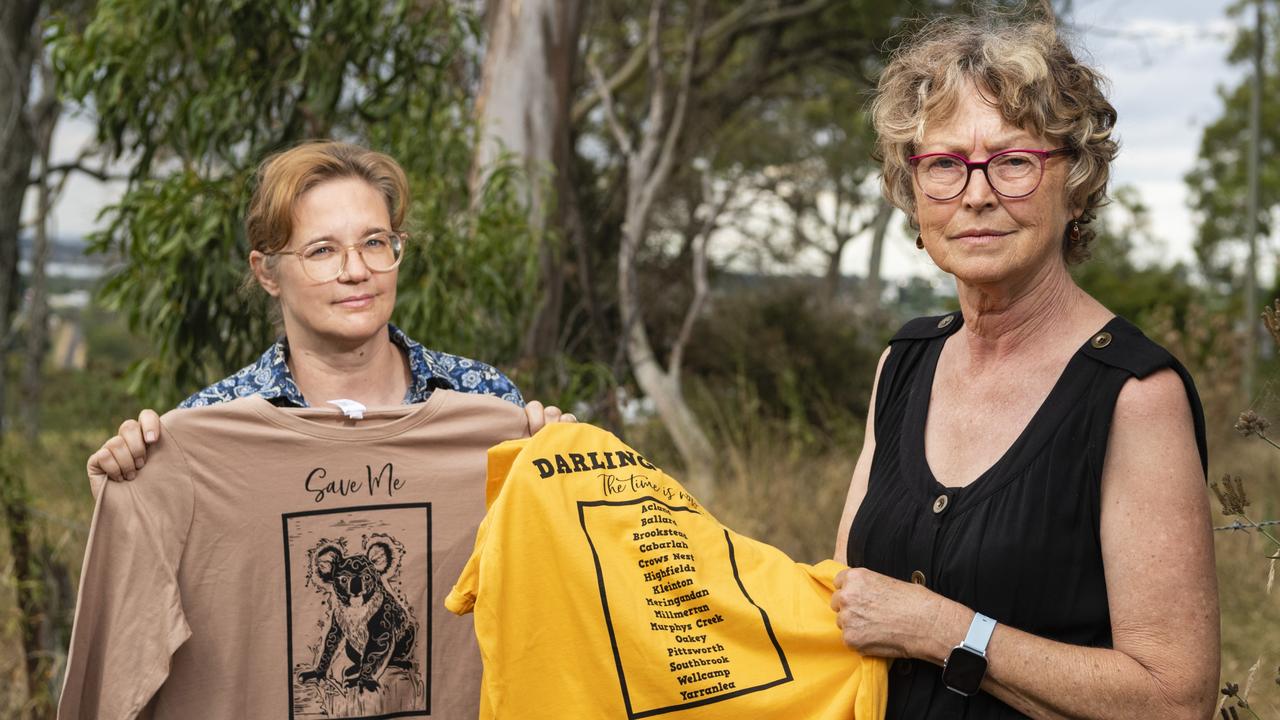 Darling Downs Environment Council co-ordinator Penny Claringbull (left) and DDEC's Koala Tree Project co-ordinator Jenny Withnall as Darling Heights residents and concerned citizens gather to protest a subdivision development in Frew St, Monday, January 23, 2023. Picture: Kevin Farmer