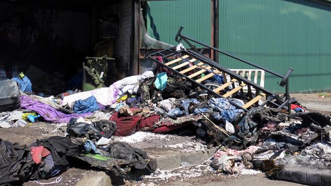 Clothing and furniture after the factory fire last year. Picture: AAP/Alex Murray