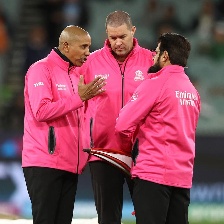 The umpires during a pitch inspection.