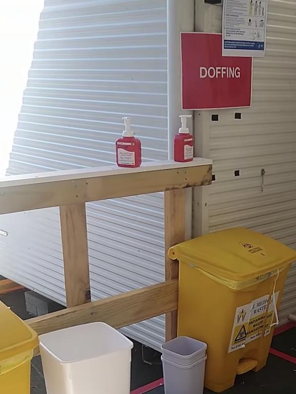 Doffing station where staff remove their PPE (personal protective equipment). Picture: Macquarie University