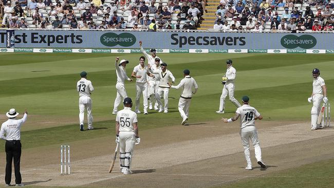 Australian players celebrate during their win in the first Test. Picture: Getty Images