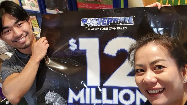 Greystanes Centre Newsagency's Thu Than (right) is overwhelmed with excitement about selling the winning ticket.