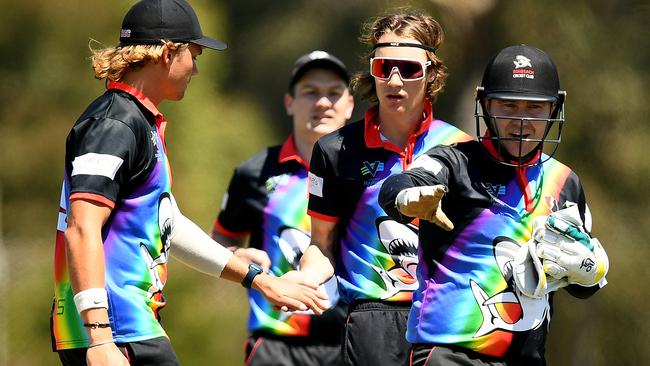 Jamie Matheson (wearing sunglasses) is congratulated by teammates. (Photo by Josh Chadwick)