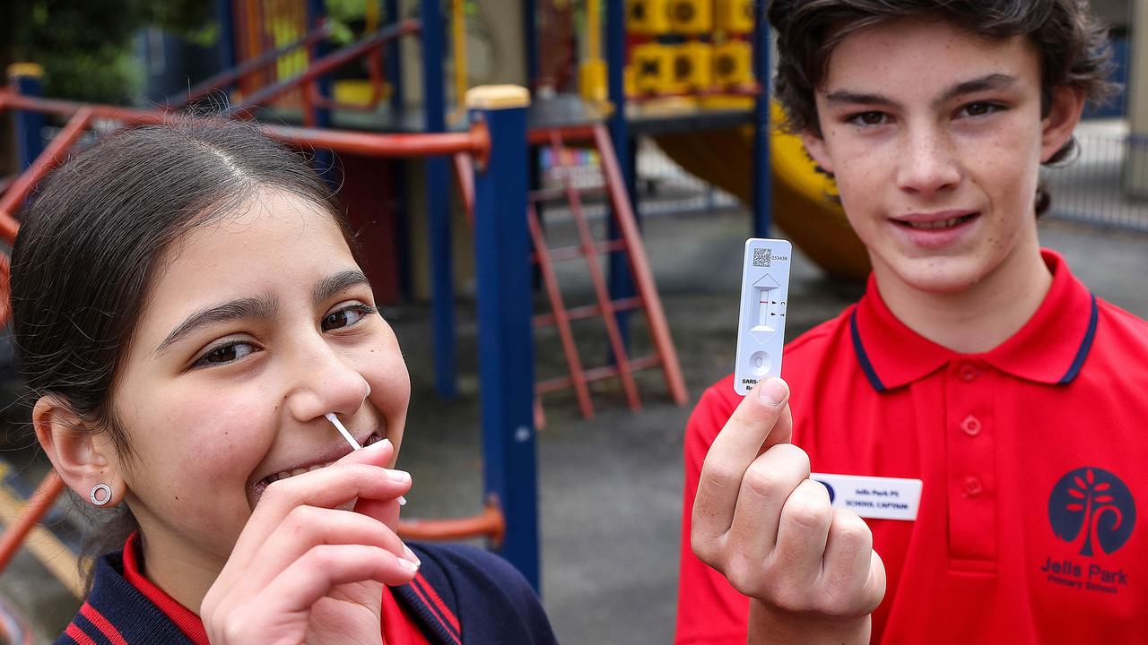 Students at Jells Park Primary School Captains with a rapid antigen test kit. Picture: NCA NewsWire / Ian Currie