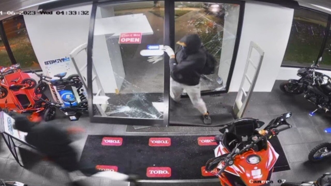 The offenders captured on Gladstone Motorcycles CCTV.