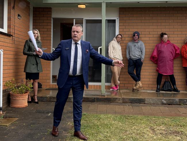 McGrath Geelong auctioneer David McGuiness and listing agent Egle Skridulis conduct the auction at 38 Marendaz Rd, Waurn Ponds.