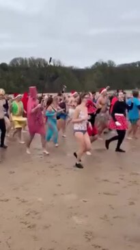 Festive Swimmers Brace the Cold in Boxing Day Plunge