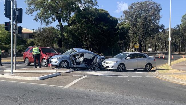 Emergency services at the scene of the crash in Golden Grove. Picture: George Yankovich