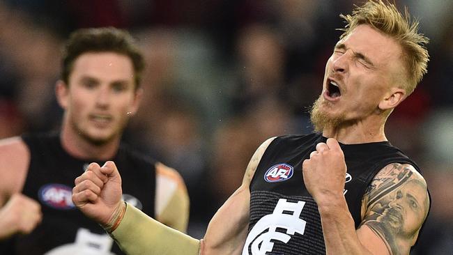 Dennis Armfield reacts after kicking a goal (AAP Image/Julian Smith).