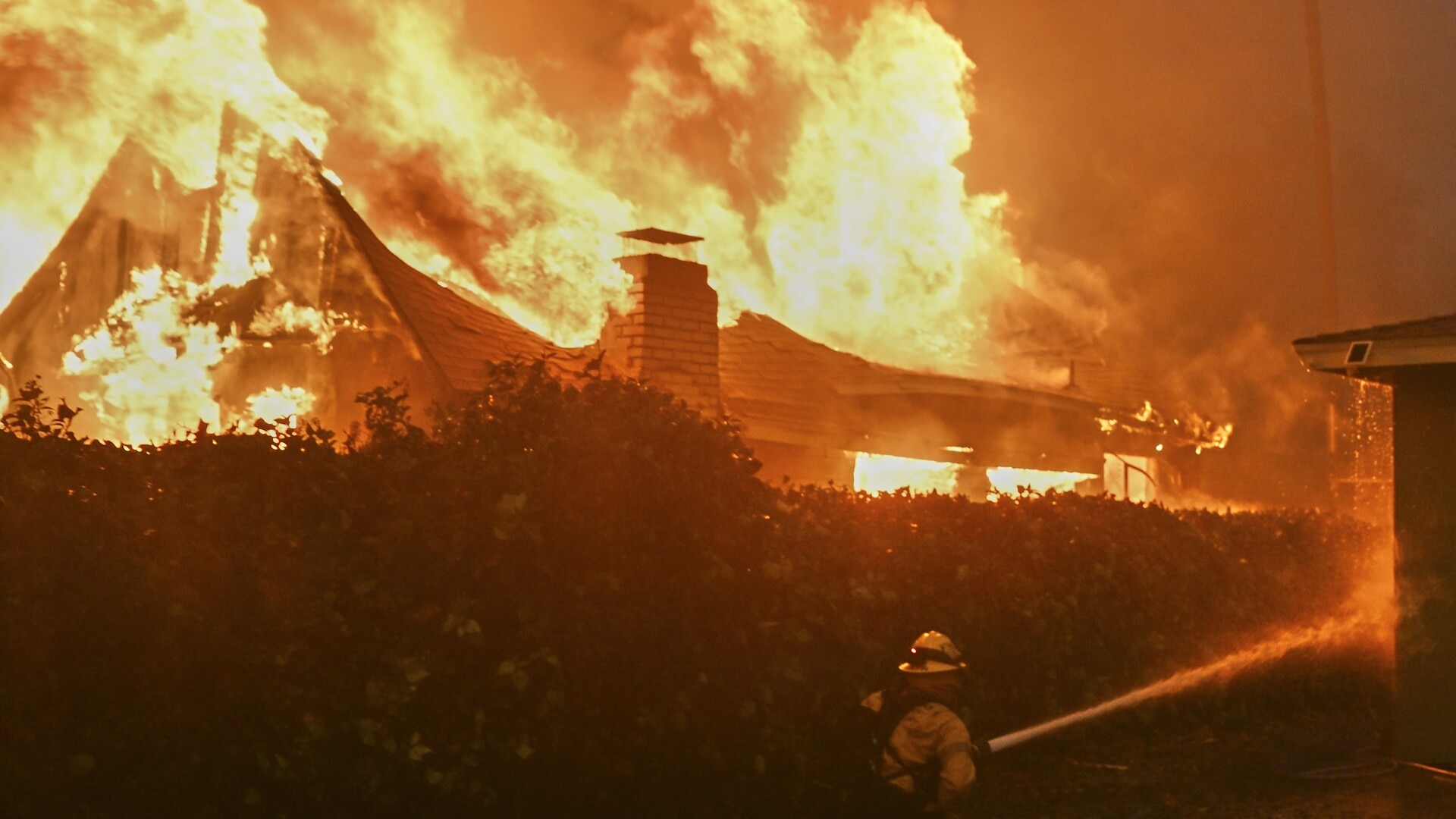 Two dead, 70,000 ordered to evacuate as Los Angeles bushfires in ...