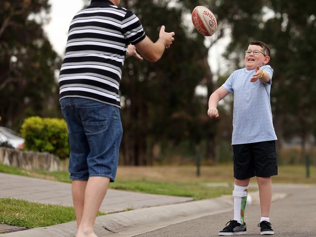 A quick session of street footy with dad Glen.