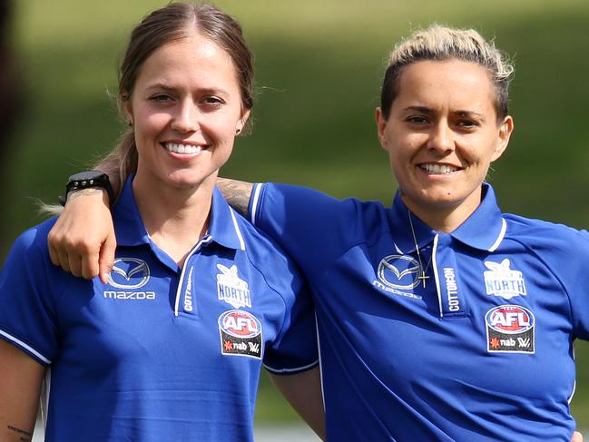 North Melbourne AFLW sprint test.  Kaitlyn Ashmore and Moana Hope watch on . Pic: Michael Klein