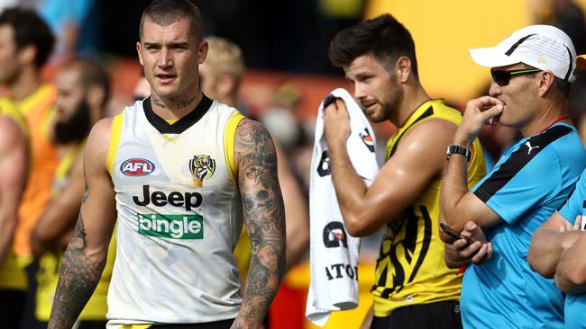 Dustin Martin recovers on the boundary. Picture: Mark Dadswell