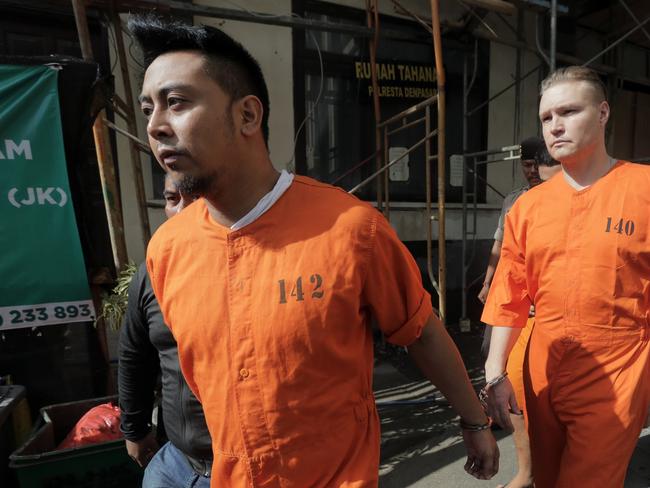 Australians David Van Iersel (back) and William Cabantog escorted by Denpasar Police. Picture: Lukman S. BIntoro