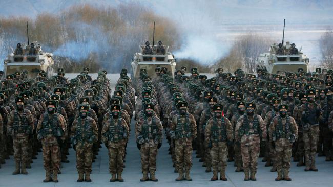 Chinese People's Liberation Army (PLA) soldiers assemble during military training at Pamir Mountains in Kashgar, northwestern China's Xinjiang region. Picture: Getty