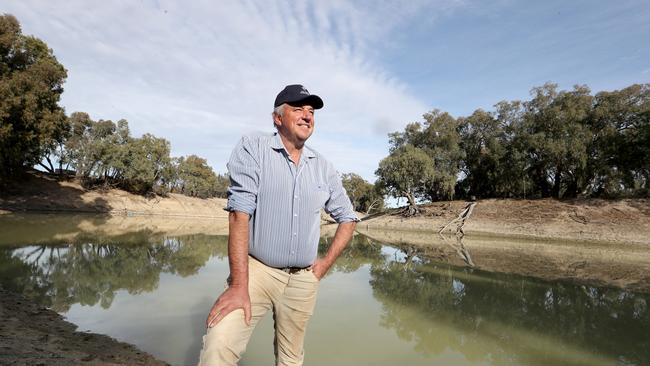 Bank on it: Rob McBride on the bank of the Darling River at Tolarno Station. Picture: David Geraghty