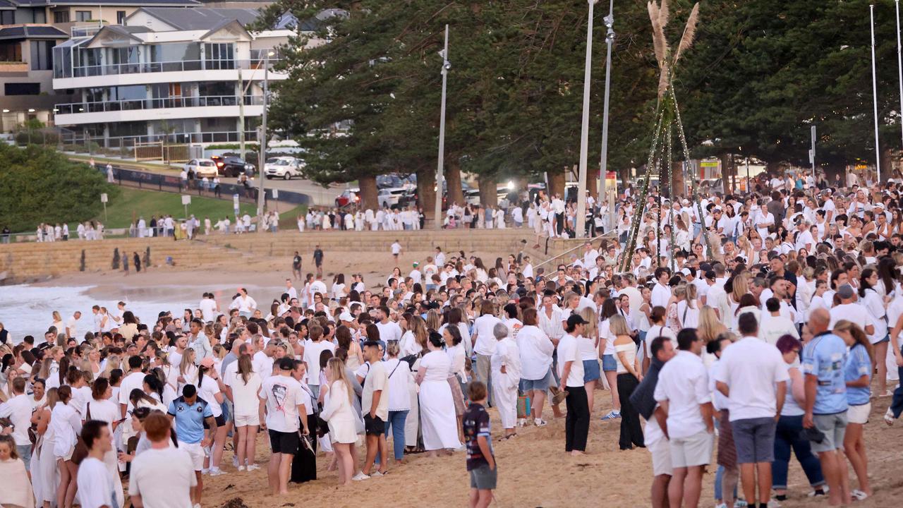A crowd gathered for the Audrey Griffin memorial on Terrigal Beach.Picture: NewsWire / Damian Shaw