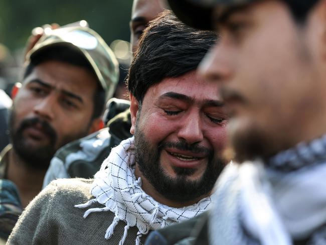 A supporter of the Hashed al-Shaabi paramilitary force reacts during the funeral procession of Iranian military commander Qasem Soleimani. Picture: AFP