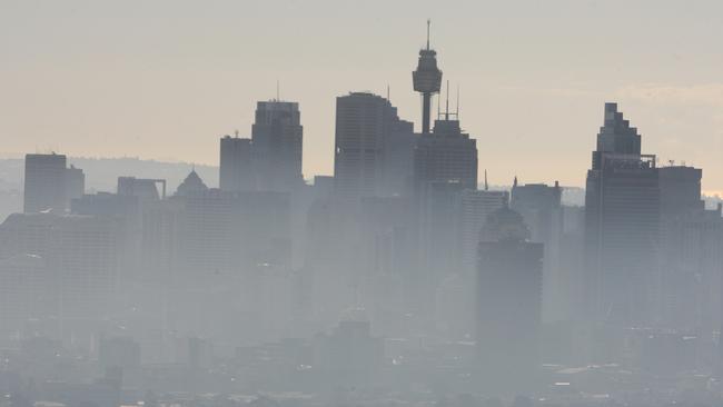 Smog engulfs the Sydney skyline on a summer morning.