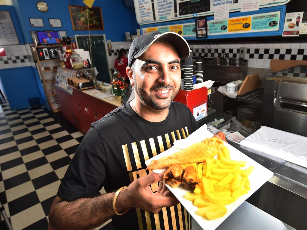 Robbie Sandhu at Craigieburn fish 'n' chip with special packs made up for disadvantaged people. 