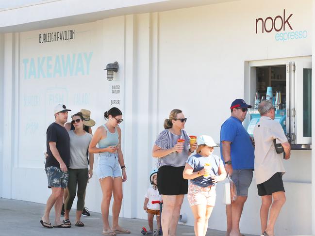 Locals queue for their daily coffee fix at The Nook at the Burleigh Pavillion. Picture: Glenn Hampson