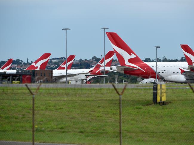 Qantas planes are parked at Sydney International Airport. Picture: AAP