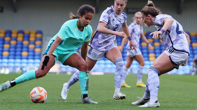 Mary Fowler controls the ball under pressure from Nicola Docherty of Scotland. Picture: Getty Images