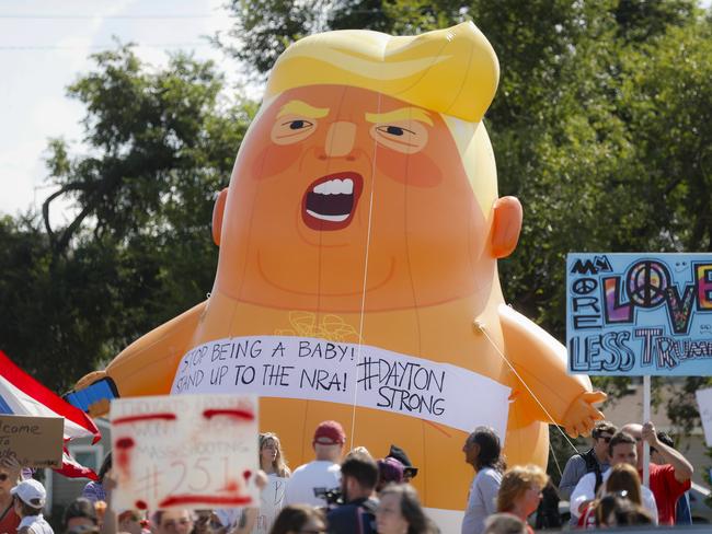 Trump baby blimp, an inflatable effigy of the Republican president in a nappy made an appearance at the Ohio protests. Picture: AP