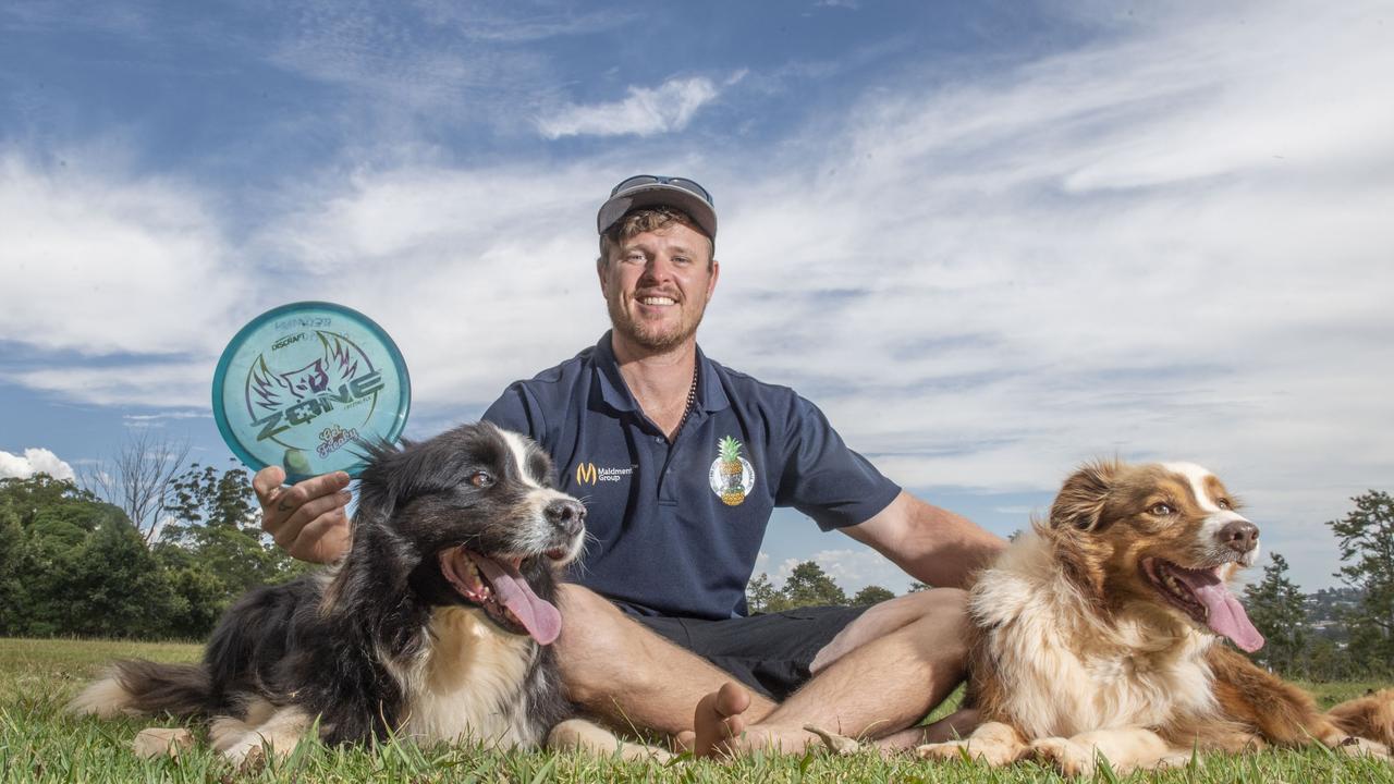 Keron Redman, with his dogs Archer and Stirling, is a member of the Toowoomba Disc Golf Club. The club wants to locate to Horn Park. Wednesday, January 25, 2023. Picture: Nev Madsen.