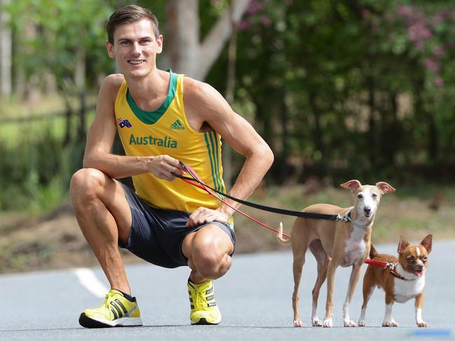 Dane Bird-Smith walking with his dogs Pina and Rocky. Pic Peter Wallis