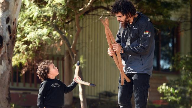 Wathaurong man Jordan Edwards and histhree-years-old son Mundarra.