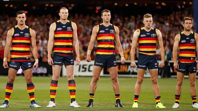 The Crows will need to find 13 wins to be sure of a fourth consecutive AFL finals series, with or without the “power stance” during the national anthem. Picture: Michael Willson/AFL Media/Getty Images