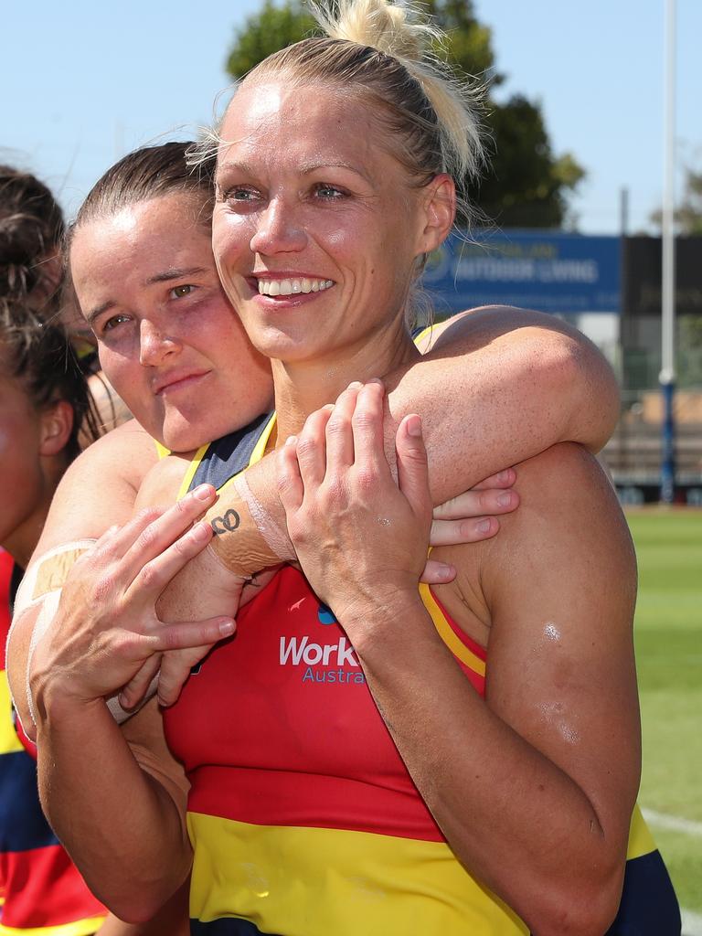 “Perko” hugs former teammate Erin Phillips after a victory together in 2019. Picture: AFL Media