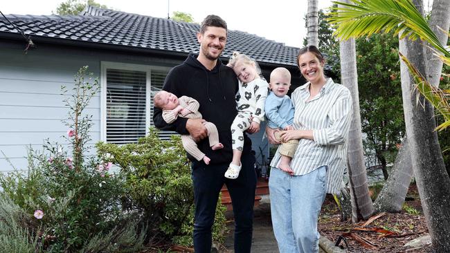 Ryan Almond and Courtney Strong with their kids Maisy 3, Harry 2 and 5 week old Leo. They have Picture: Tim Hunter.