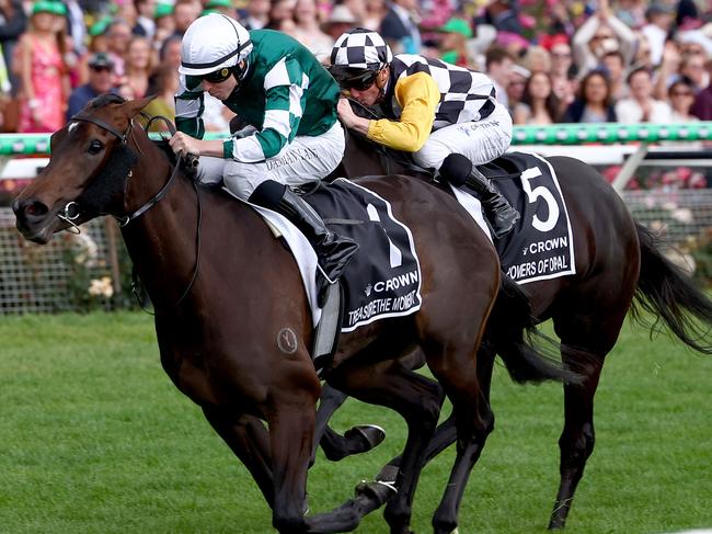 MELBOURNE, AUSTRALIA - NOVEMBER 07: Damian Lane rides #1 Treasurethe Moment to win race 8, the Crown Oaks during Oaks Day at Flemington Racecourse on November 07, 2024 in Melbourne, Australia. (Photo by Josh Chadwick/Getty Images)