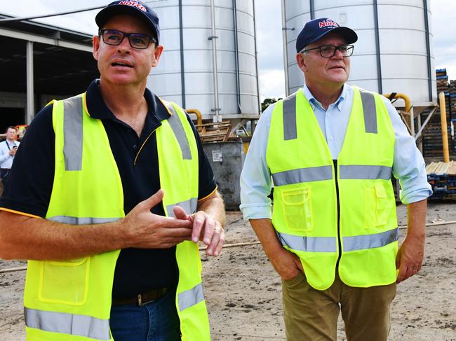 LISMORE, AUSTRALIA - NewsWire Photos - MARCH 09 2022:  Australian Prime Minister Scott Morrison visits the Norco Ice Cream factory in the flood affected town of Lismore in northern NSW March 9 2022. Pictured with Norco CEO Michael Hampson. Picture: NCA NewsWire/Elise Derwin