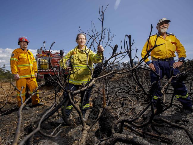 NSW Currarong RFS volunteers (l to r)Ron Lynch, Pam Zaccagnini and Vic Walker on the outskirts of Currarong on the NSW South Coast, where a hazard reduction burn got out of control and came close to homes. Picture by Sean Davey.