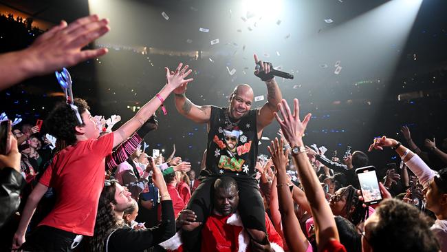 Flo Rida performs in the crowd during iHeartRadio Y100's Jingle Ball 2023 in Miami, Florida. Picture: Jason Koerner/Getty Images for iHeartRadio