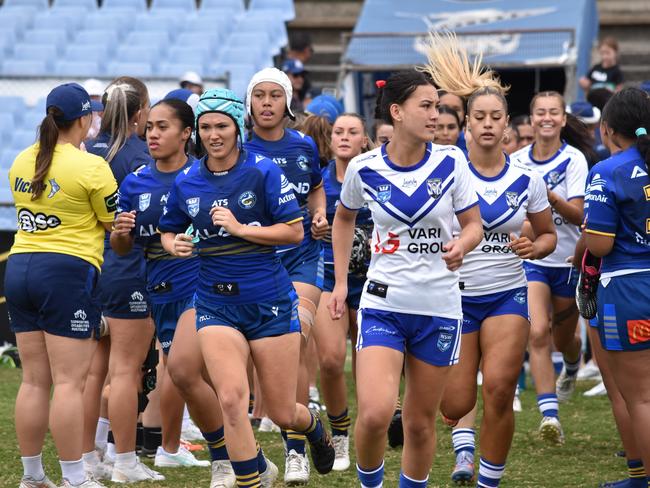 Parramatta and Canterbury run out onto the field. Picture: Sean Teuma