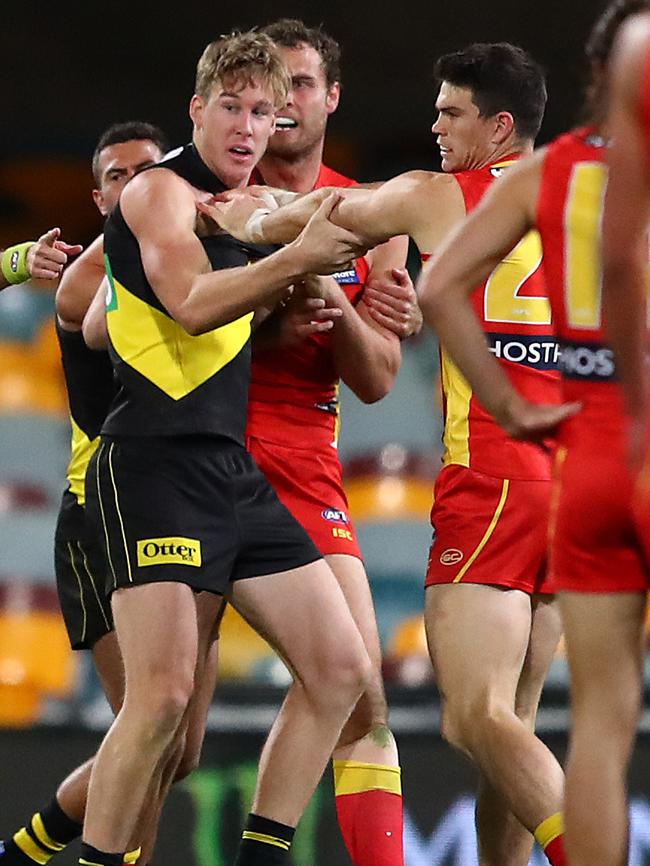 Lynch clashes with Sam Collins after Lynch hit him behind play. Picture: Getty