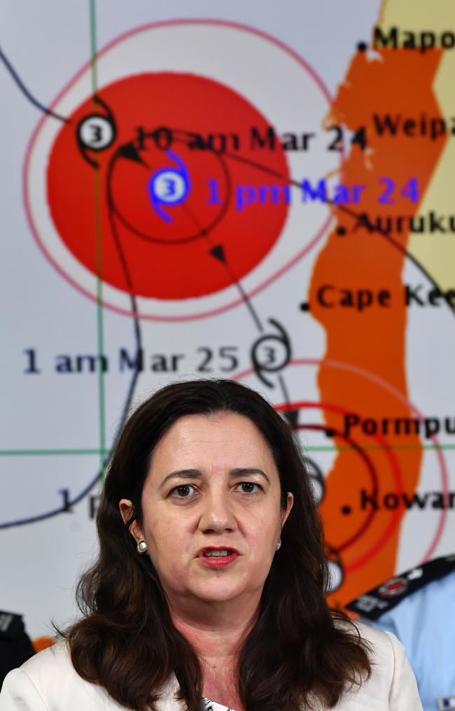 Premier Annastacia Palaszczuk fronts a media conference for a cyclone last summer.