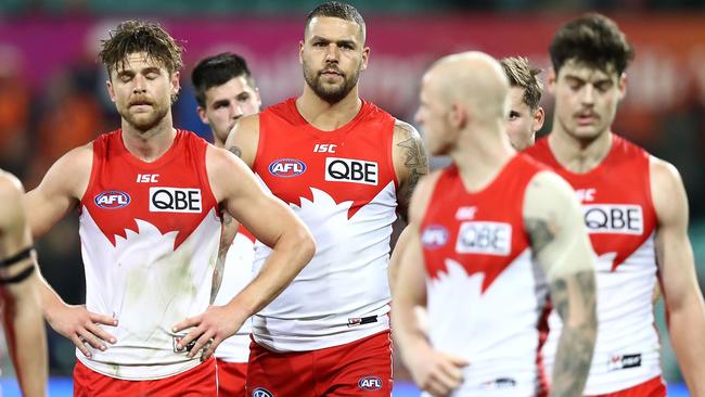 Sydney players leave the ground after their horror loss. Picture: Getty Images