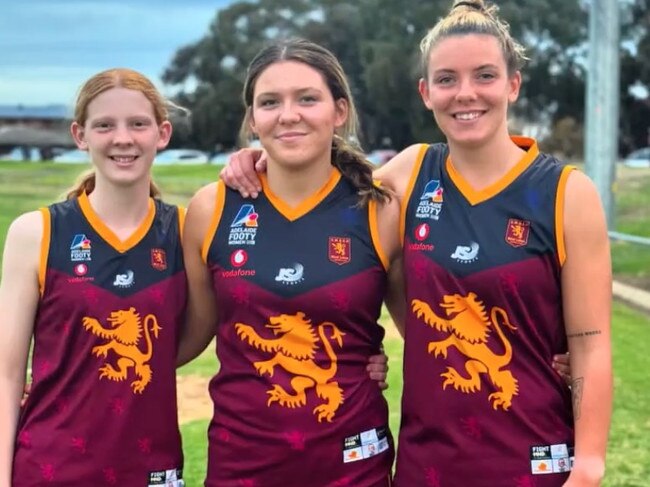 Asha Gooley (left) with sisters Imogen and Astrid. Picture: SMOSH West Lakes Football Club