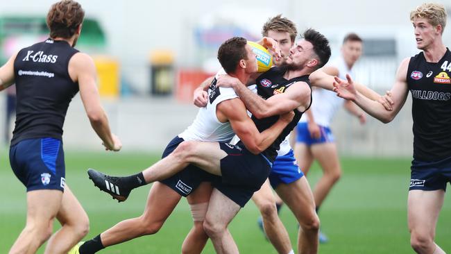 Toby McLean, right, in action during match simulation at Bulldogs training.